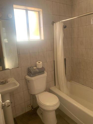 Et badeværelse på HOTEL MARIPINA