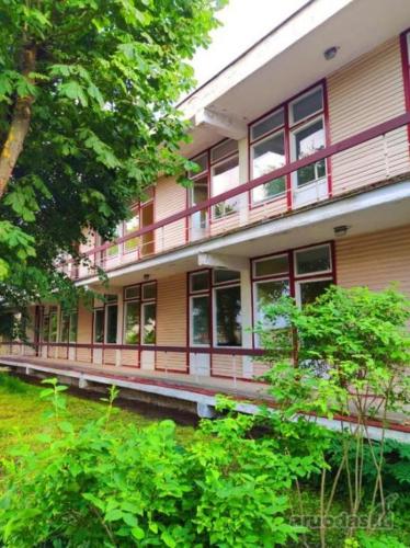 a large building with a lot of windows at MiegOK777 in Palanga
