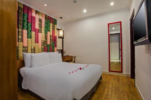Cama o camas de una habitación en Hanoi Media Hotel & Spa
