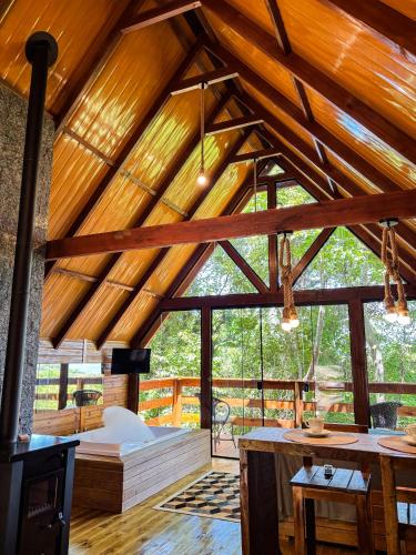 a large room with a bed in the middle at Cabanas do Bosque in Três Coroas