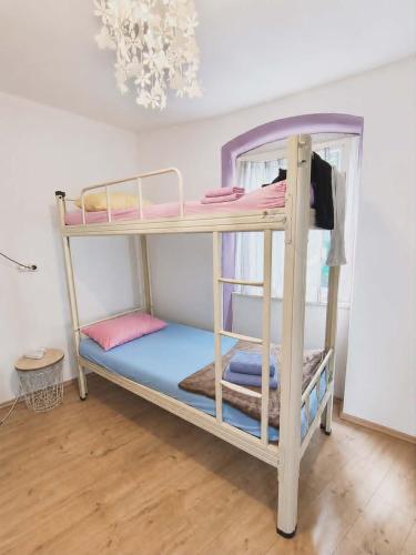 a couple of bunk beds in a room at Guest House Emilio 1 in Split