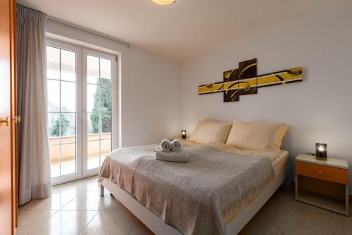 Apartments with parking space Rozac, Umag - 27272