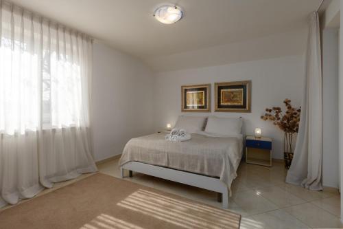 Apartments with parking space Rozac, Umag - 27272