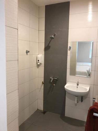 Koupelna v ubytování Brezza Hotel Sitiawan