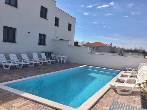 Apartments with swimming pool Murine, Umag - 27509