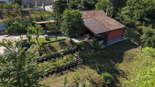 an overhead view of a small house with a garden at Vila Lokvanj in Gornja Vranjska
