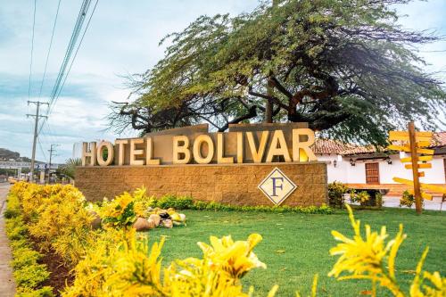 a hotel bolivar sign in front of a building at Hotel Faranda Bolivar Cucuta, a member of Radisson Individuals in Cúcuta