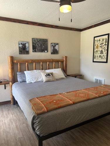 a bedroom with a large bed in a room at Columbia Point Resort in Kettle Falls