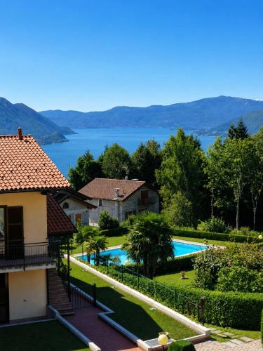 a view of a house and a swimming pool at Residenza Paradiso in Agra