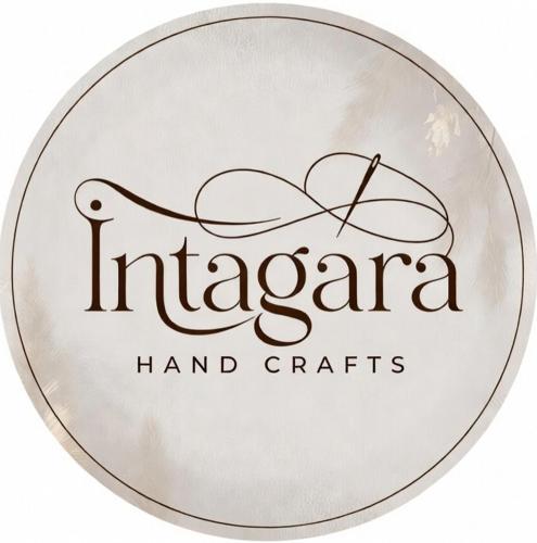a metal circle with the words incacion hazard hand crafts at INTAGARA Handcrafts in Butare