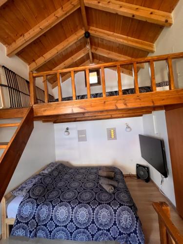 a bedroom with a bed in a room at Princeps De Cura Traditional in Symi