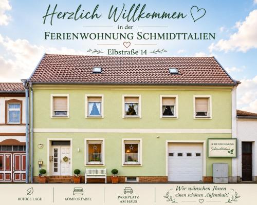 a house with the words herbal williamsen in the farwegian working schmid at Ferienwohnung Schmidtalien,inklusive Infrarotsauna in Dommitzsch