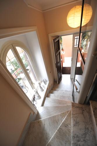 a view of a staircase with a door and a window at Villa Zaccardi in Rome