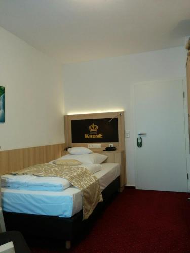 Cama o camas de una habitación en Wellness Hotel Garni Krone