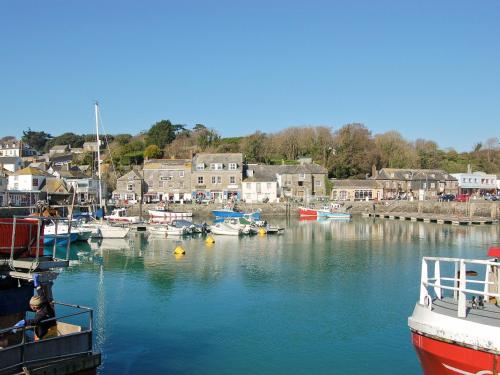a group of boats are docked in a harbor at Treyarnon in Saint Merryn