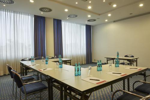 Kawasan bisnes dan/atau bilik persidangan di H4 Hotel Kassel