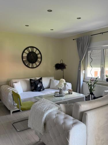 a living room with a couch and a table at Villa Magnifica in Mostar