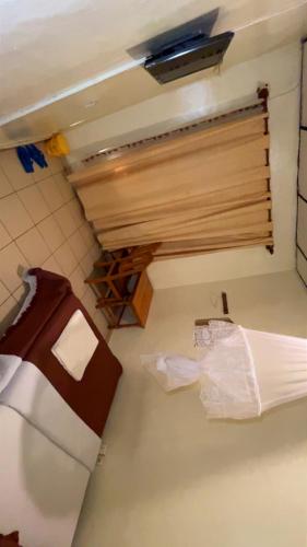 a room with a counter and a window in a kitchen at piece motel in Kigali