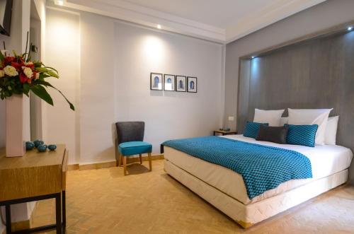 เตียงในห้องที่ Riad Ayni