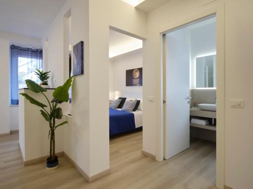 a bedroom with a bed and a large mirror at Palazzo house in Palazzo