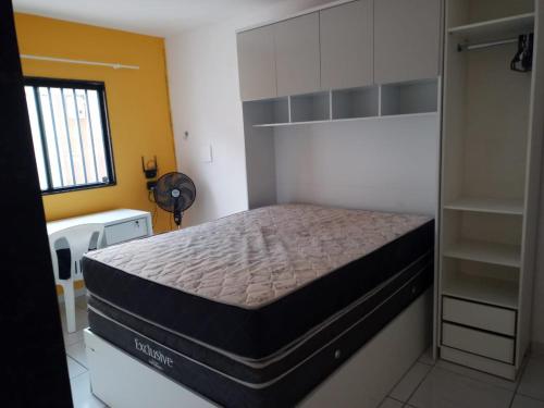 a bedroom with a bed in a room at recanto sossego in Garanhuns