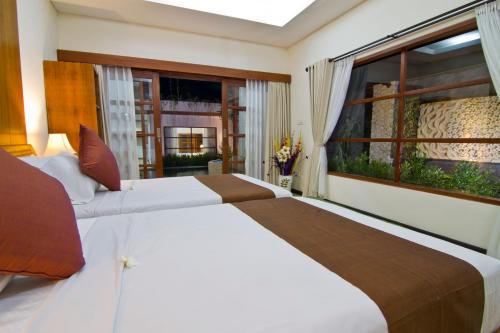 Cama o camas de una habitación en Maha Residence Guest House