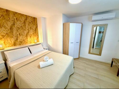 Llit o llits en una habitació de Altea Group Experience