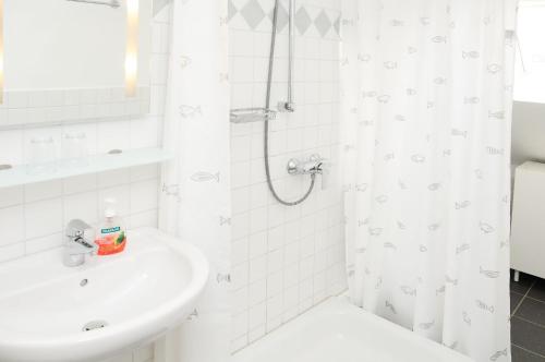 Koupelna v ubytování Apartments Blütenweg