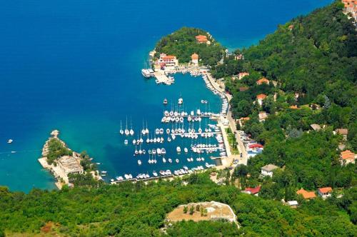 an aerial view of a harbor with boats in the water at Room Marta in Omišalj