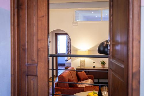 a view of a living room with a couch at Marta Lake Albergo Diffuso & Spa in Marta