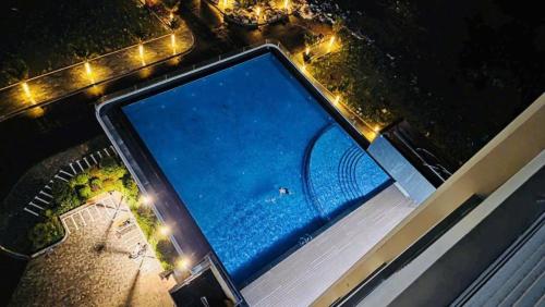an overhead view of a tennis racket on a tennis court at Khách sạn LAzur in Cửa Lô