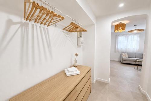a kitchen with a wooden counter in a room at L'Esterel Appartements Plage 450m & Gare Saint-Raphael 950m in Fréjus