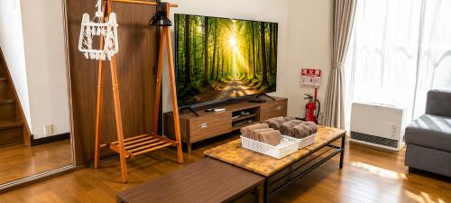 A forest guesthouse with barbecue facilities