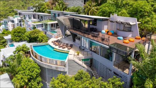 an aerial view of a house with a swimming pool at Scenery Samui in Chaweng