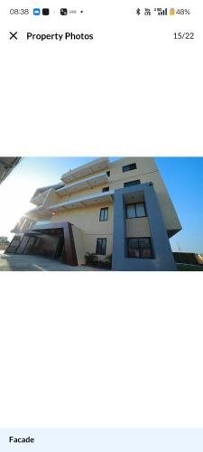 a screenshot of the properties page of a building at HOTEL The Breeze in Pachamba