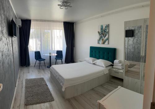 Garsoniera Centru tesisinde bir odada yatak veya yataklar