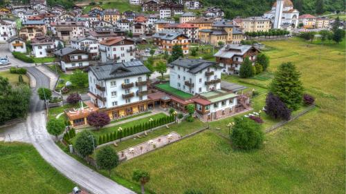 an aerial view of a town with houses at Hotel Panoramic in Auronzo di Cadore