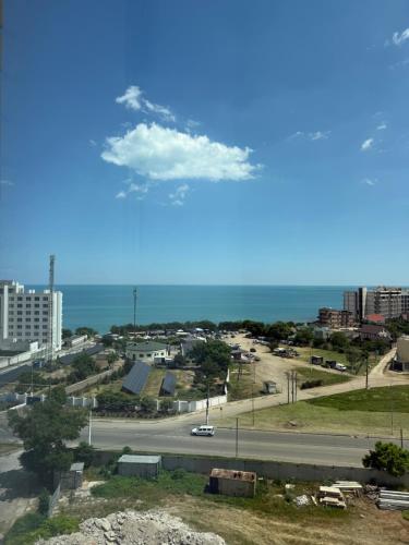 a view of a city with a road and the ocean at Квартира с Видом на Море, жк Парус, 9-3 in Chornomorsk