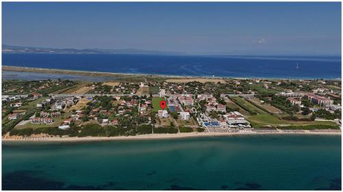 an aerial view of a resort on a beach at Buena Vista - San Mames in Agios Mamas