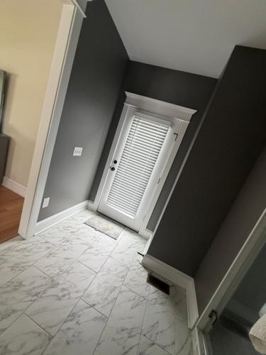 an empty room with a door with a window at Room in private house for Rent in Nice Neighborhood in Midlothian
