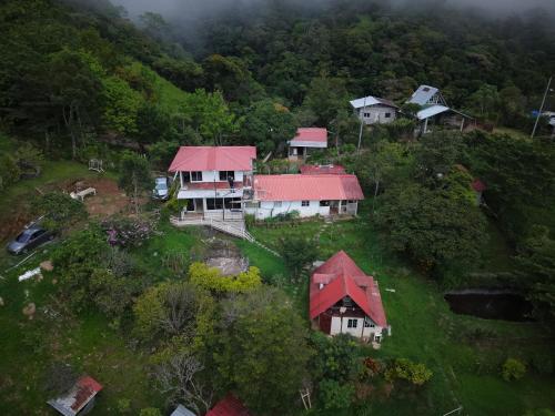 an aerial view of a house with a red roof at Cabaña vista Volcán Barú in Gualaca
