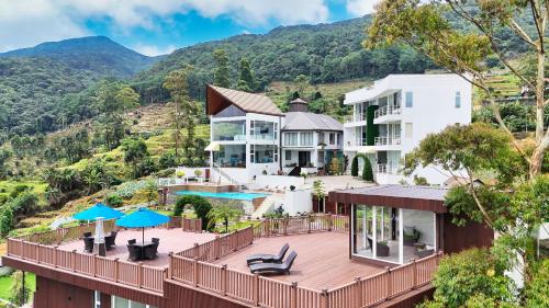 an aerial view of a house with a deck at Hilldale Retreat in Nuwara Eliya