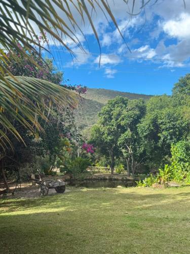 a view of the mountains from the garden at Pousada e Camping Sá Zabé in Rio de Contas