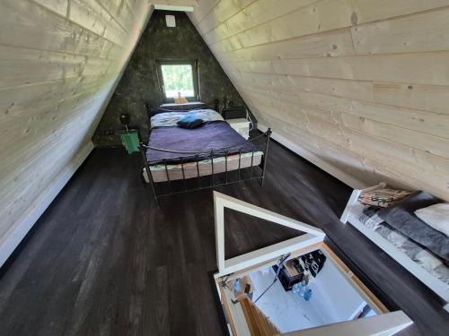an overhead view of two beds in a attic at Sauna-ForRest in Marynin