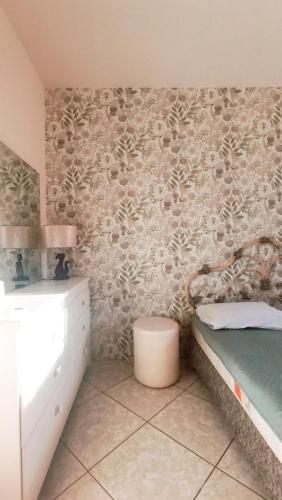 a bathroom with a bed and a sink at Anavyssos Serenity Villa in Anavyssos