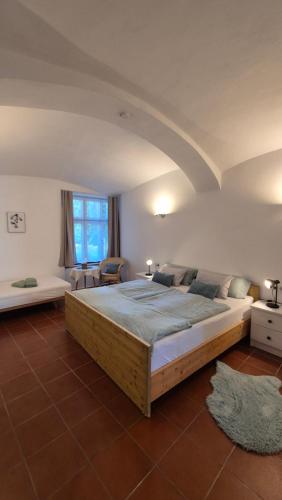 a bedroom with a large bed in a room at Apartment Mauthen 19 in Mauthen