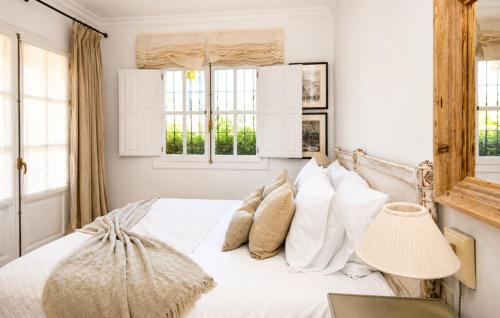 Relaxed Mediterranean Living With A Private Garden & Beachside Location