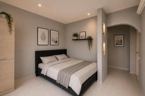 a bedroom with a large bed in a room at Columna Residence in Chişinău
