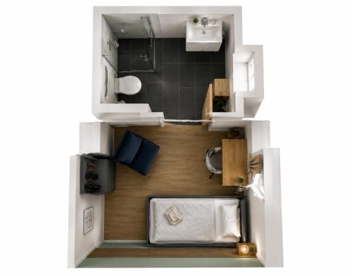 a rendering of a small kitchen in a tiny house at Leipzig Garden Rooms - Near Lake & easy Parking in Leipzig
