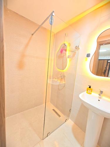 a bathroom with a shower and a sink at Ryad el houda in Agadir